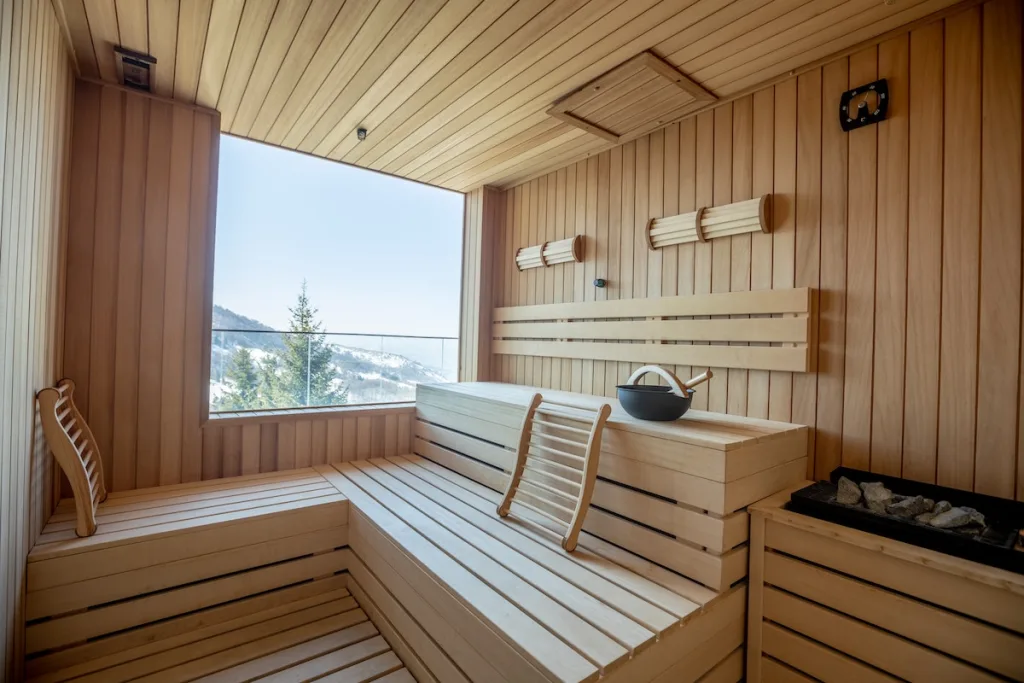 An empty sauna with light wood.