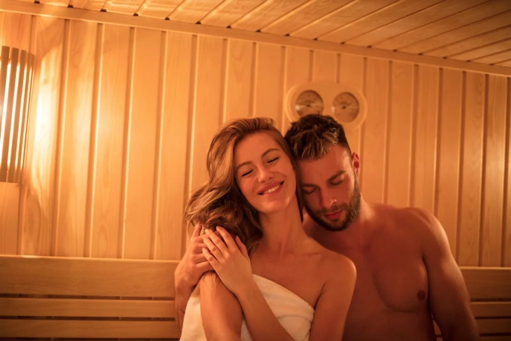 A couple in a sauna, man and woman