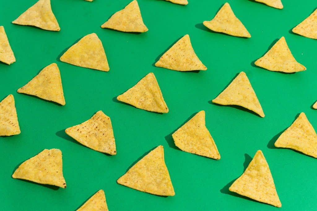 Yellow chips against a green background