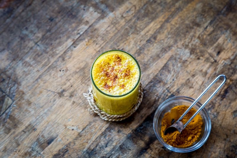 A photo of tumeric milk, a great way to get the 10 benefits of turmeric