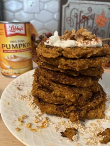 Oatmeal Pumpkin Pancake in a stack with a can of pumpkin next to it.