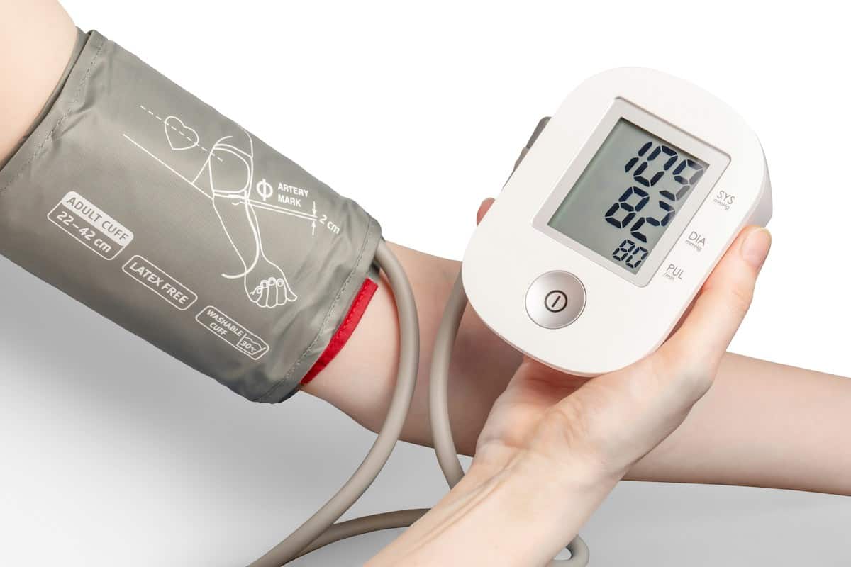 A blood pressure cuff on an arm