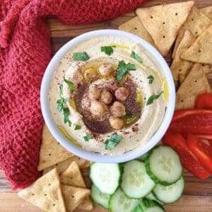 Plant-forward recipes includes Mediterranean Hummus 1200 x 1200 with pita chips and red bell peppers