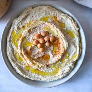 overhead view of mediterranean hummus without parsley