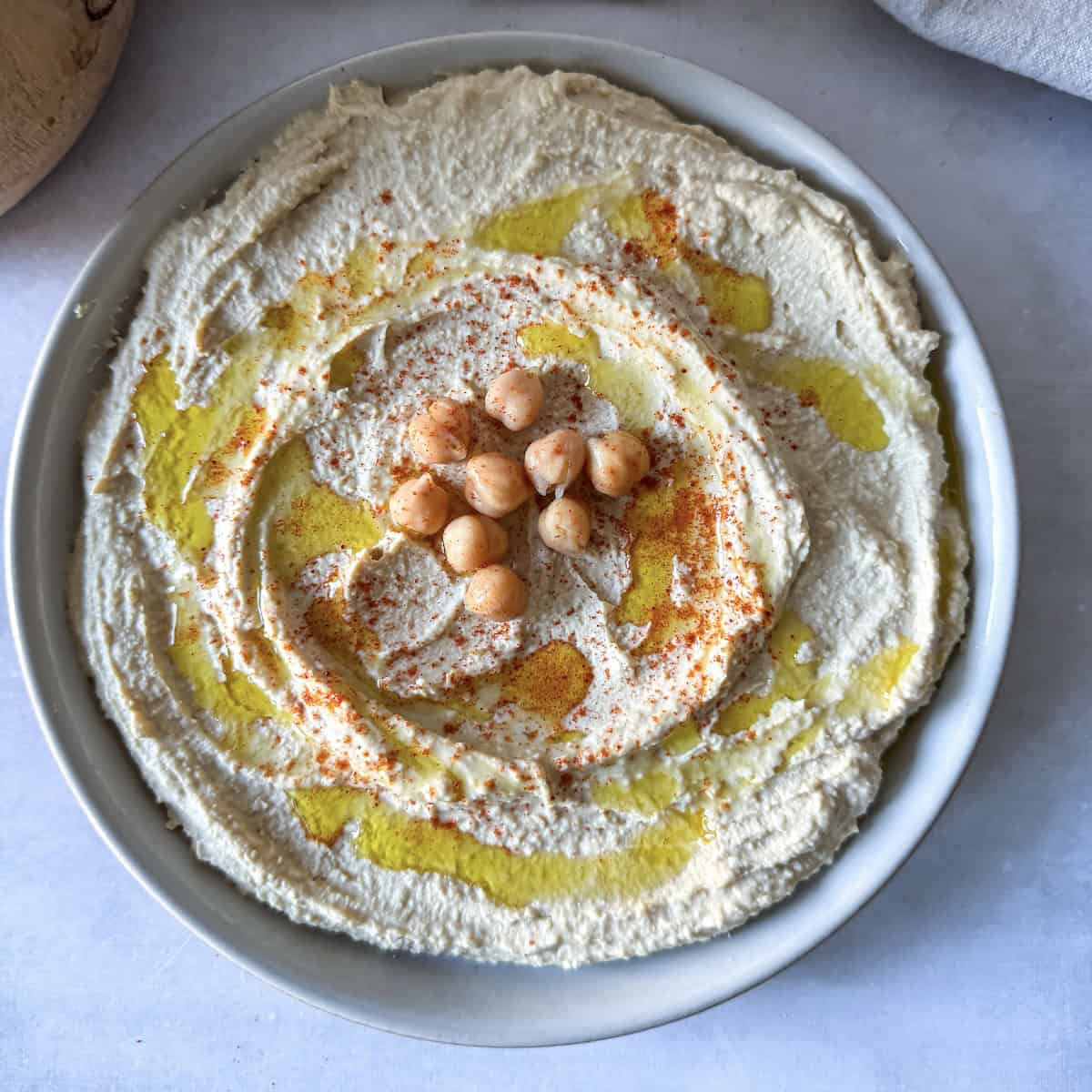 overhead view of mediterranean hummus without parsley