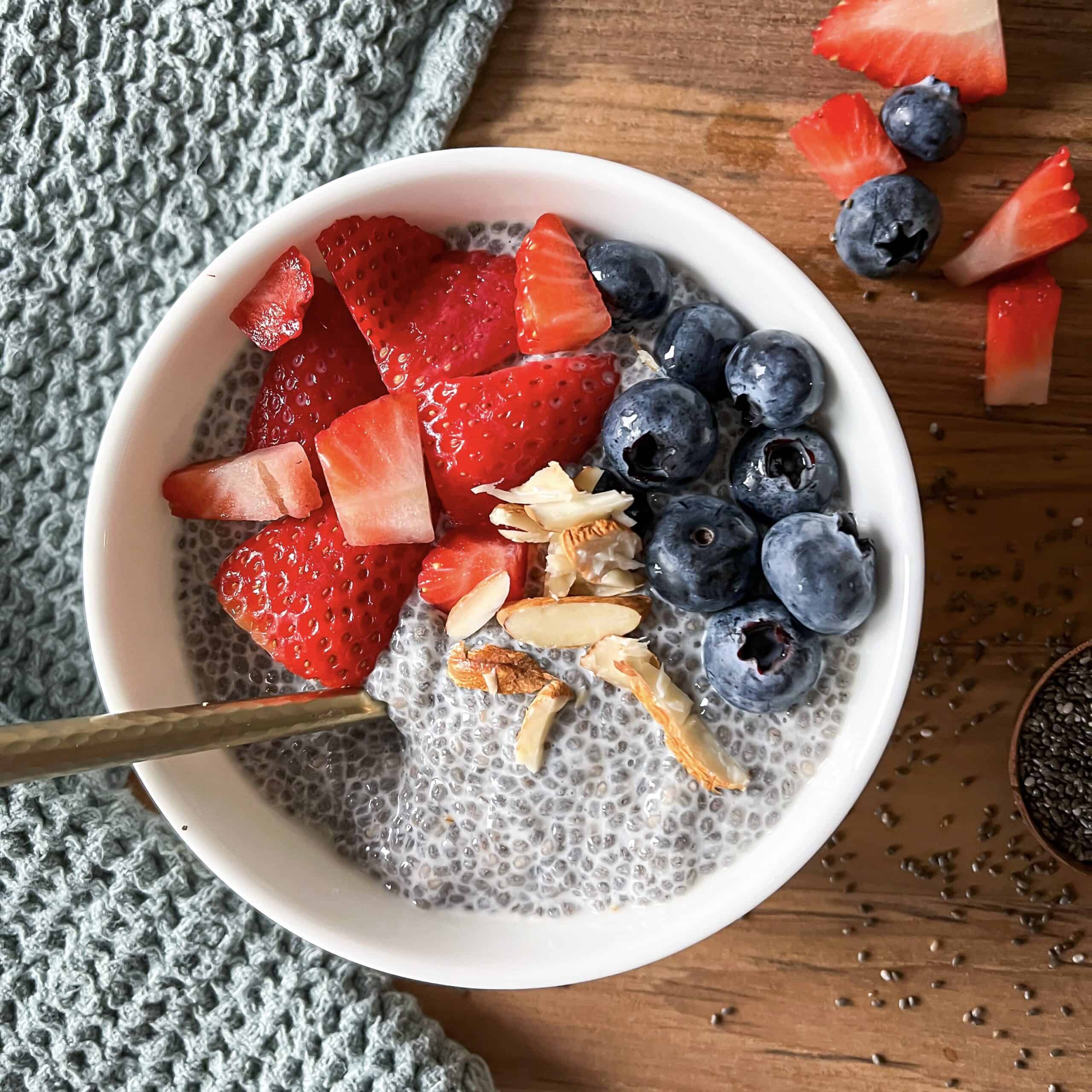 chia seeds overnight in a bowl with fresh berries on top