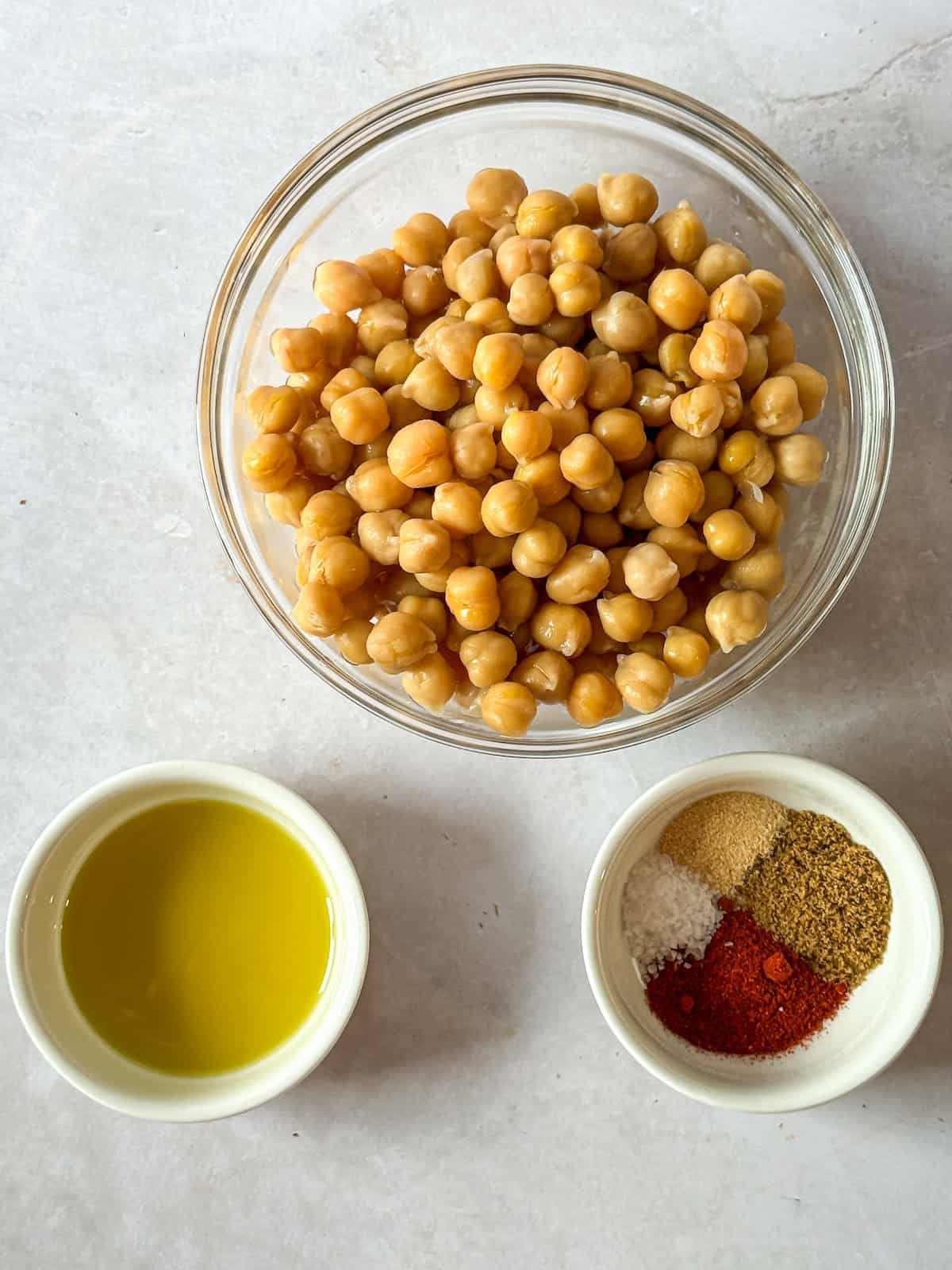 Ingredients for mediterranean roasted chickpeas on a table.