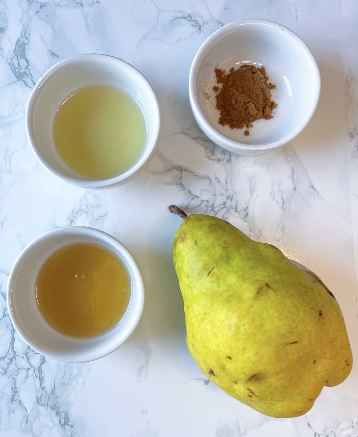 ingredients for air fryer pears in small bowls