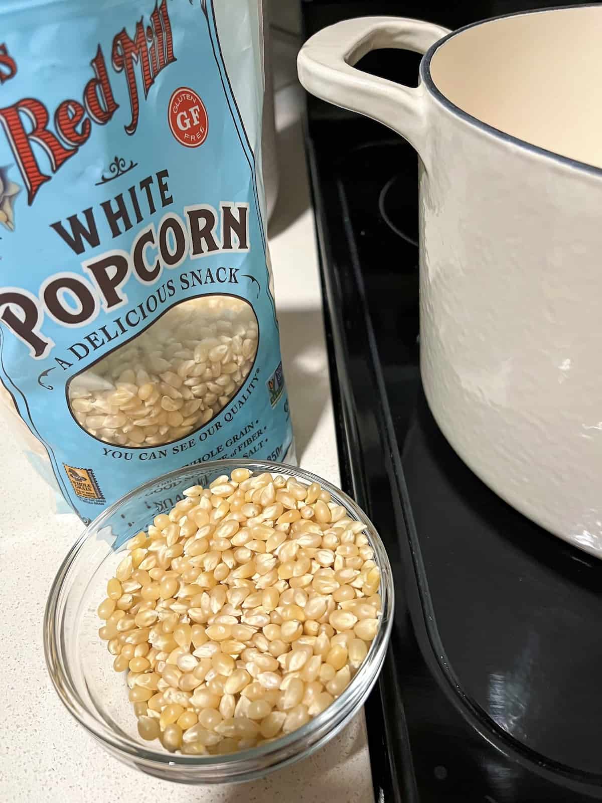 popcorn kernels about to be put in a heavy bottomed pan