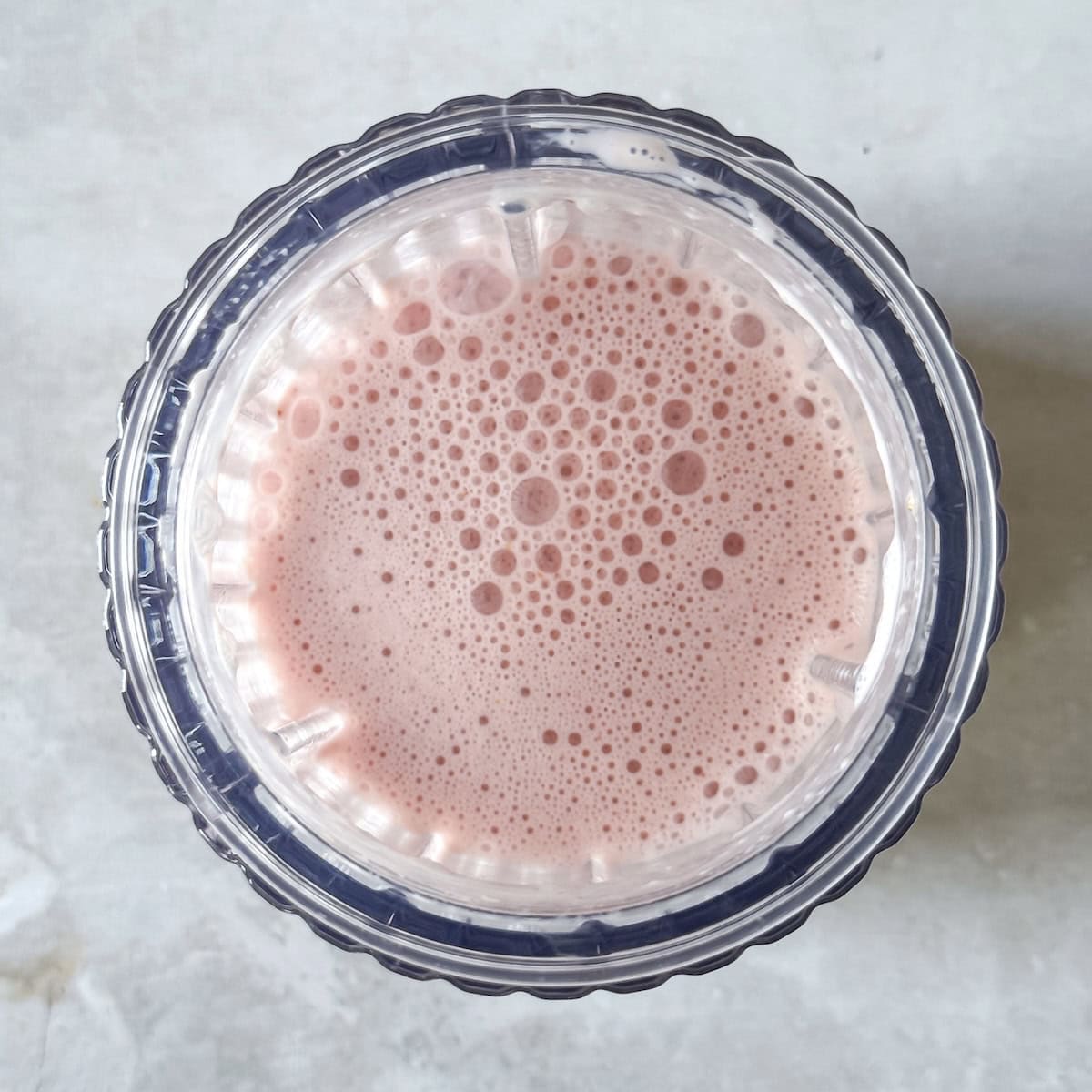 strawberries blended with greek yogurt and milk.