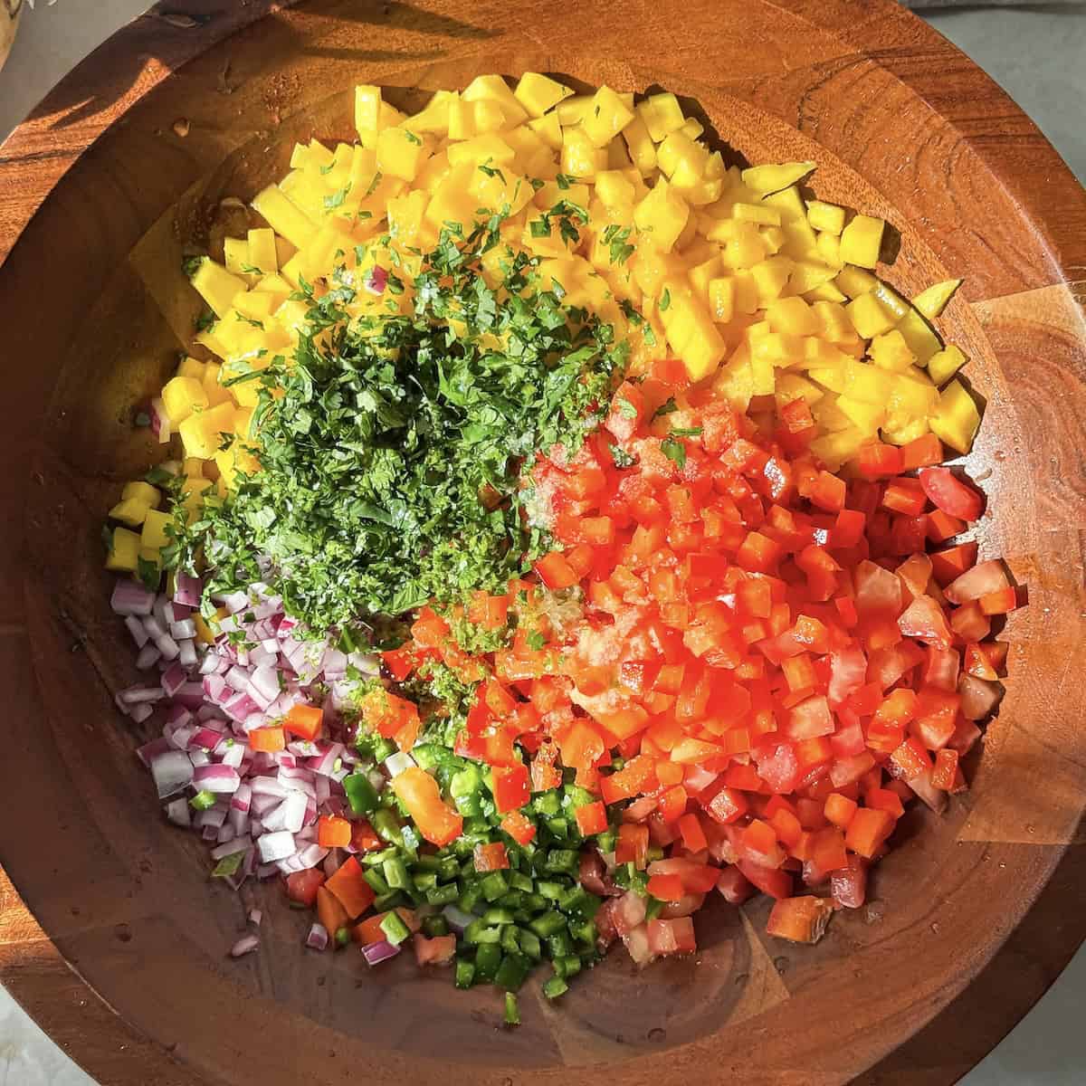 overhead view of mango pico de gallo ingredients.