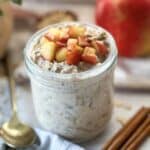 Apple cinnamon overnight oats in a mason jar.