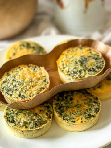 Kale and Mushroom Egg Bites on a white plate.