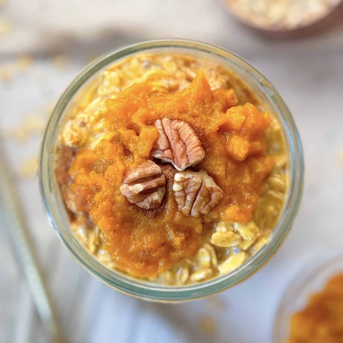 toppings added to pumpkin pie overnight oats.