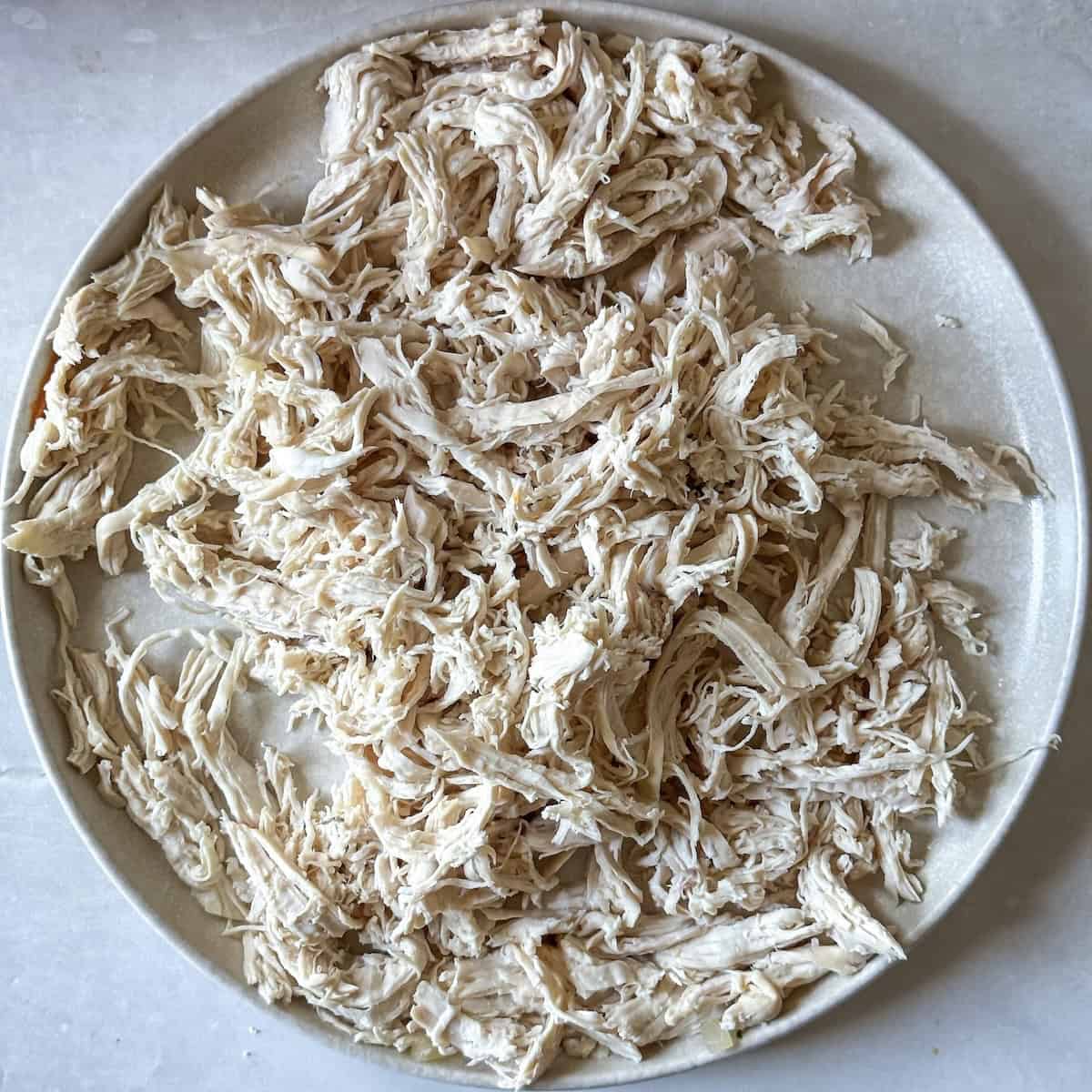 shredded chicken on a plate.