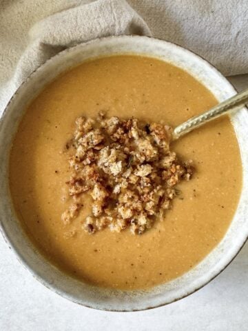 roasted cauliflower white bean soup in a bowl.