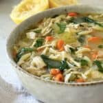 close up 45 degree angle of chicken lemon orzo soup