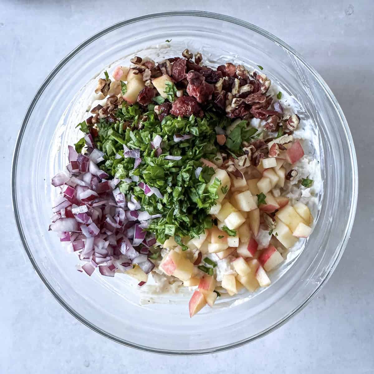 overhead view of cranberry pecan ingredients in chicken salad.