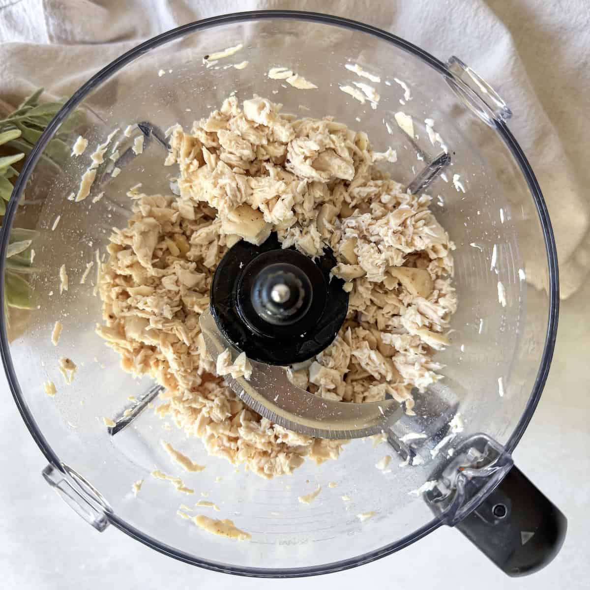 shredded chicken in a food processor.