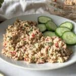 overhead view of spicy tuna salad with cucumbers 45 degree angle view.