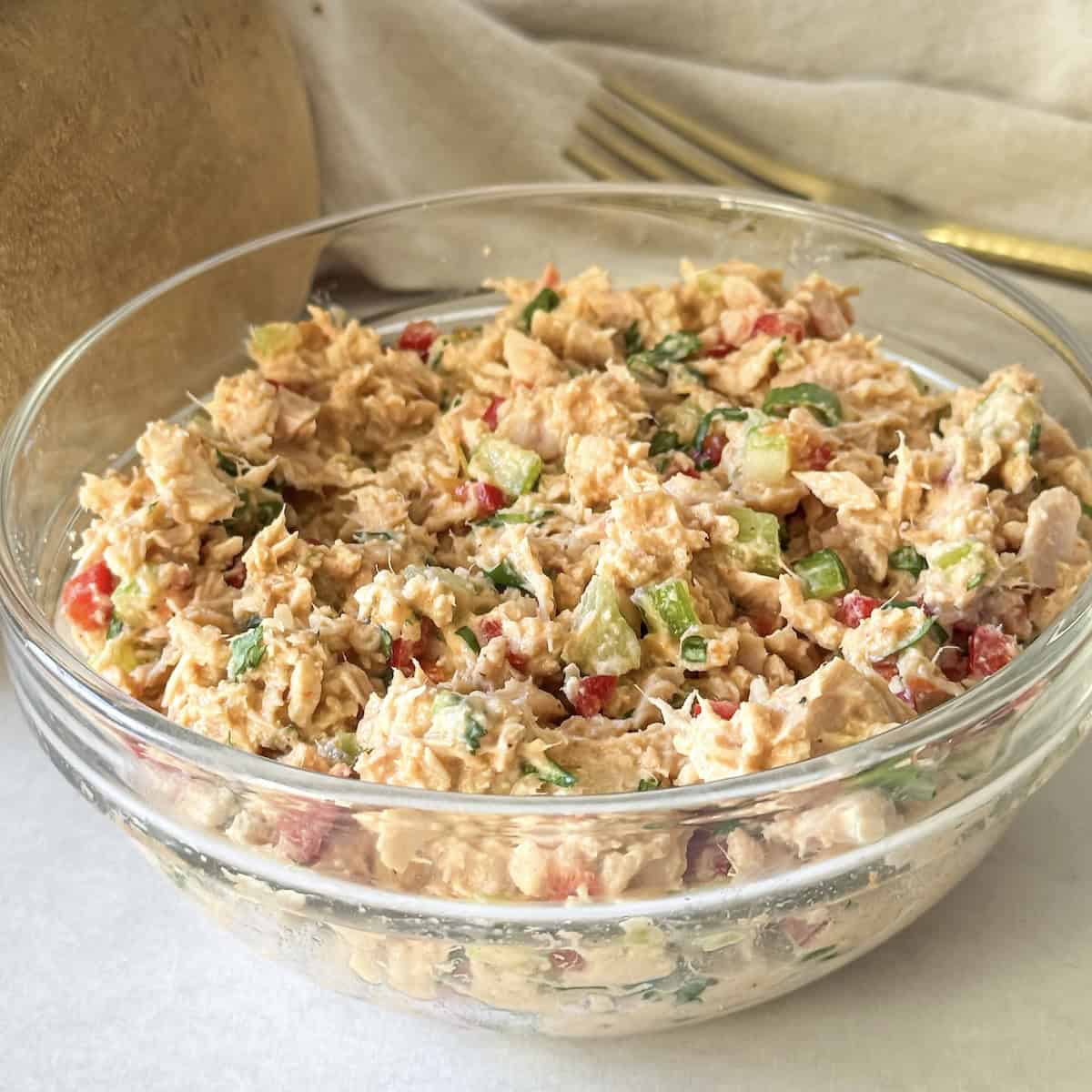 spicy tuna salad in a glass bowl.