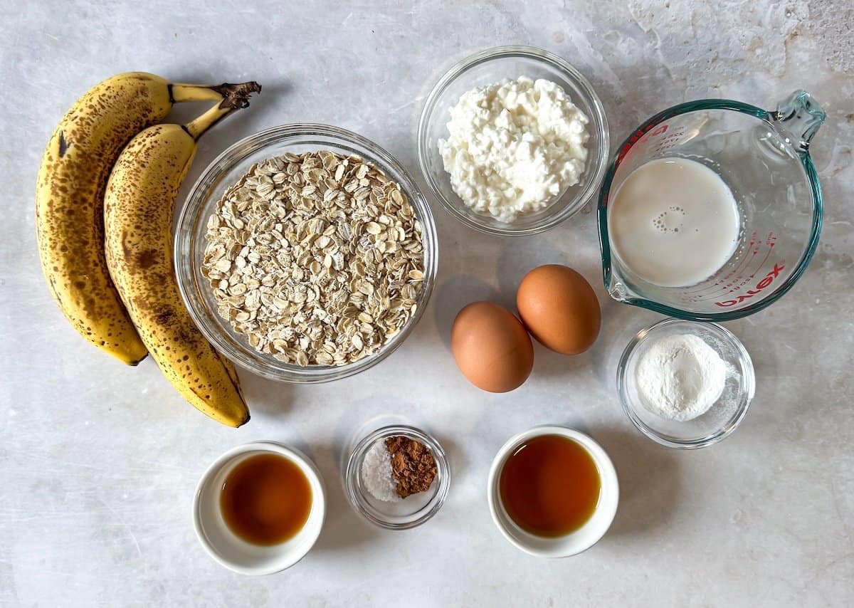 ingredients for banana oatmeal pancakes on a table.