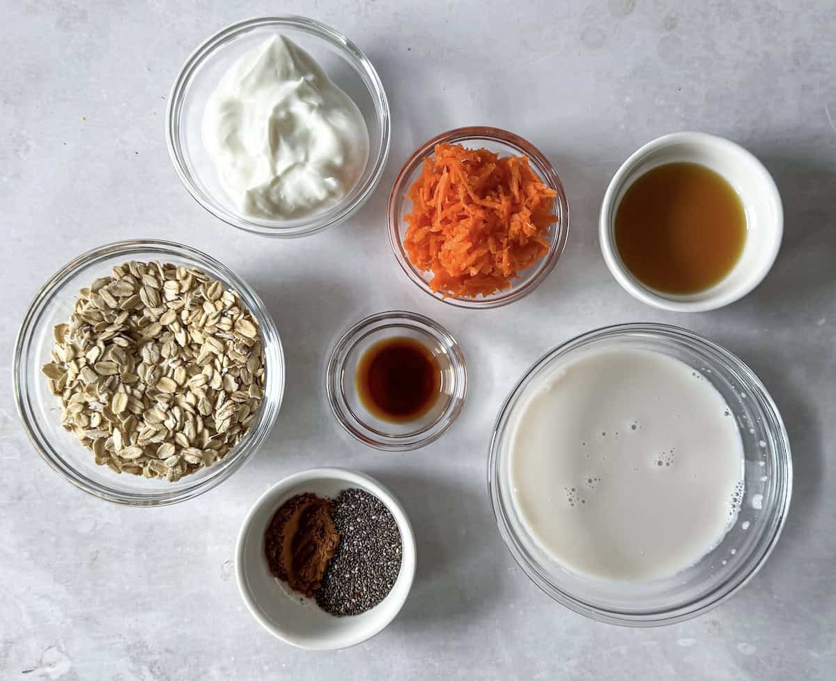 ingredients for carrot cake overnight oats on a table.