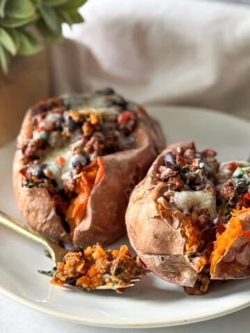 stuffed sweet potatoes on a plate.