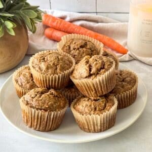 carrot banana muffins on a plate.