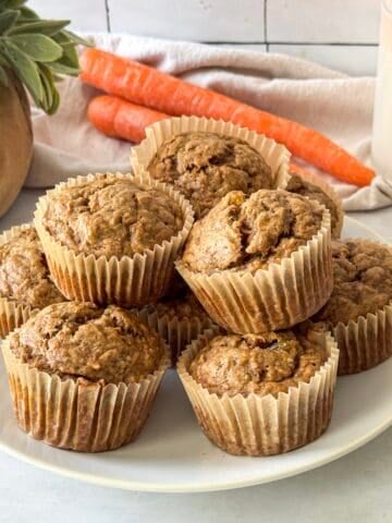 carrot banana muffins on a plate.