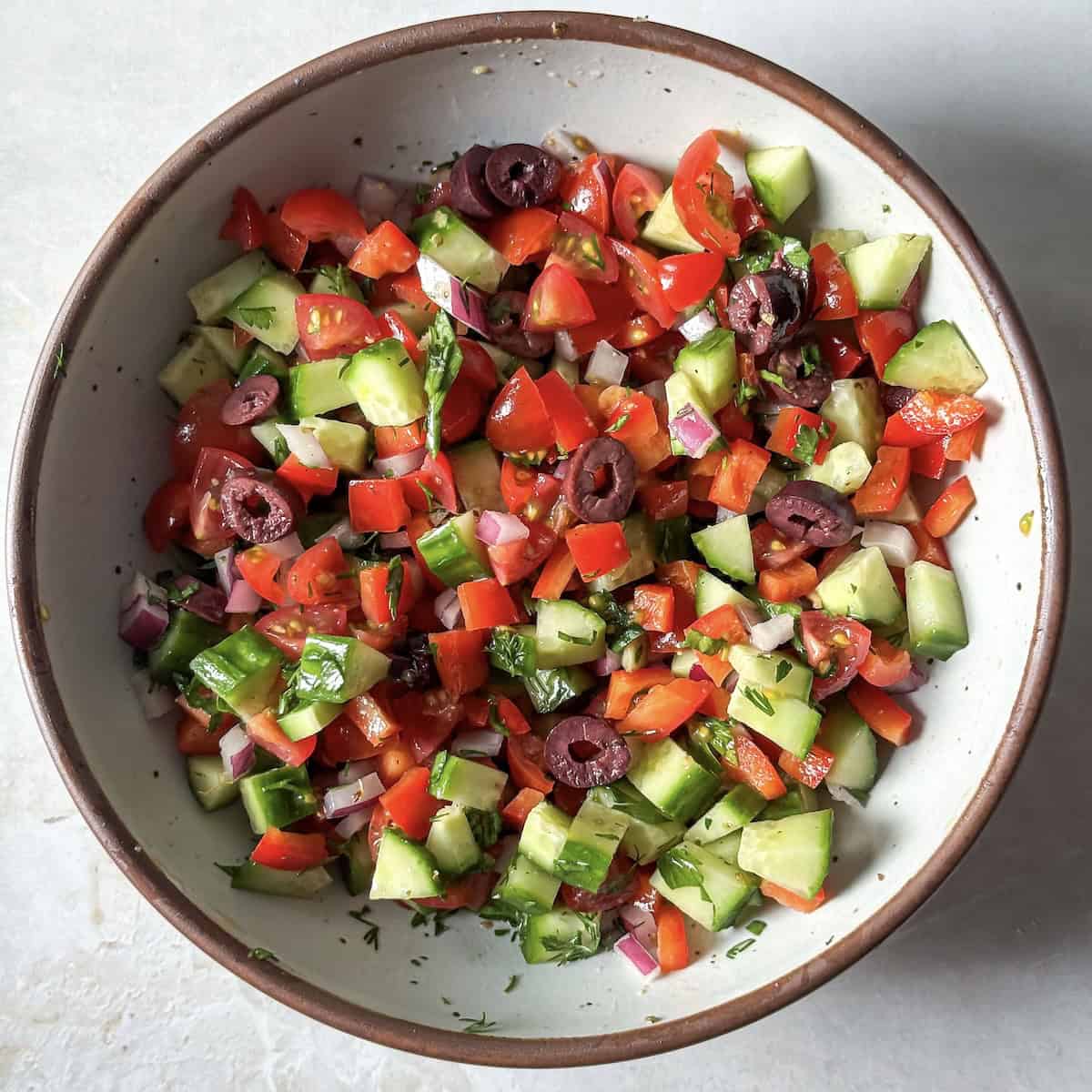 cucumber and tomato salad before feta has been added.