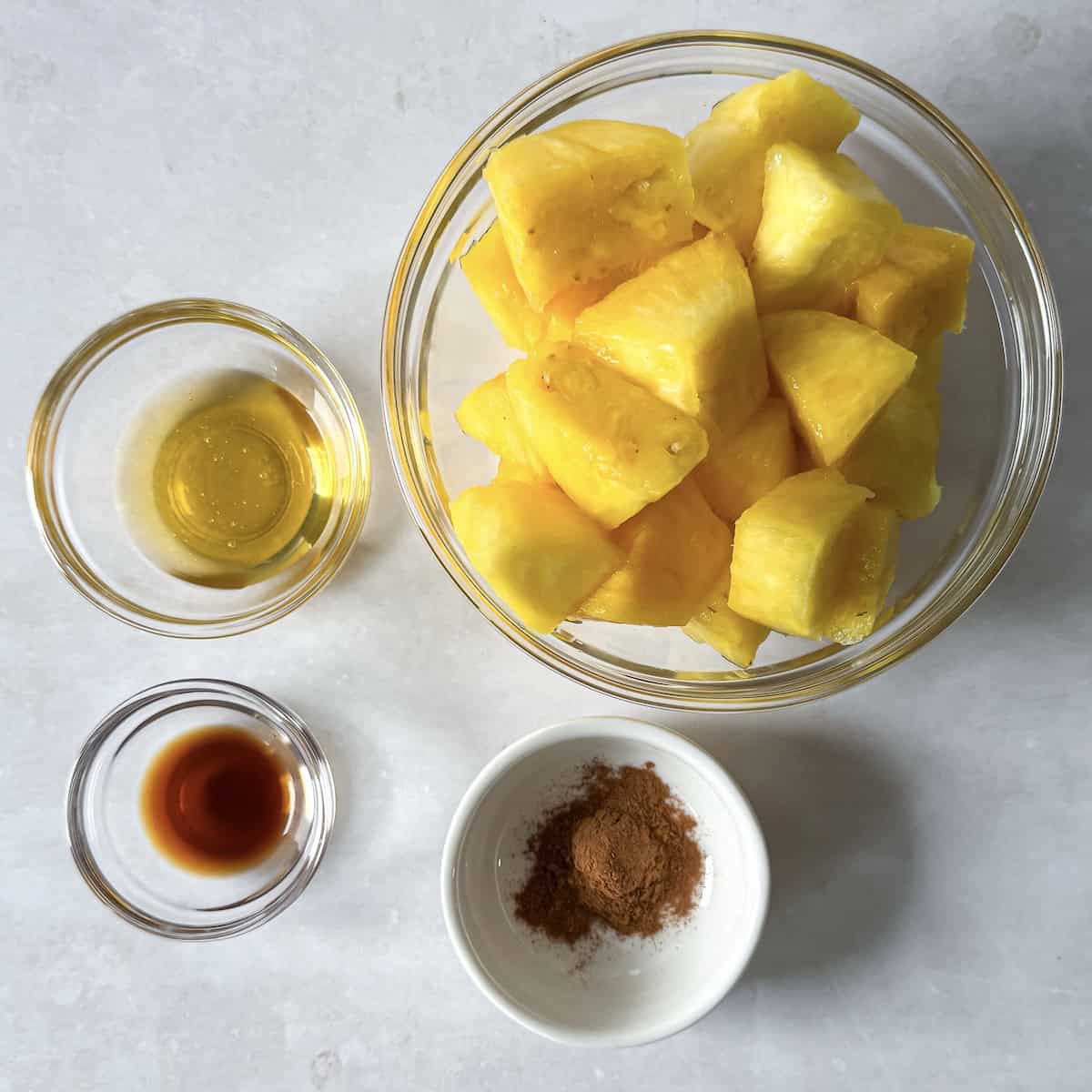 ingredients for air fryer pineapple on a table.