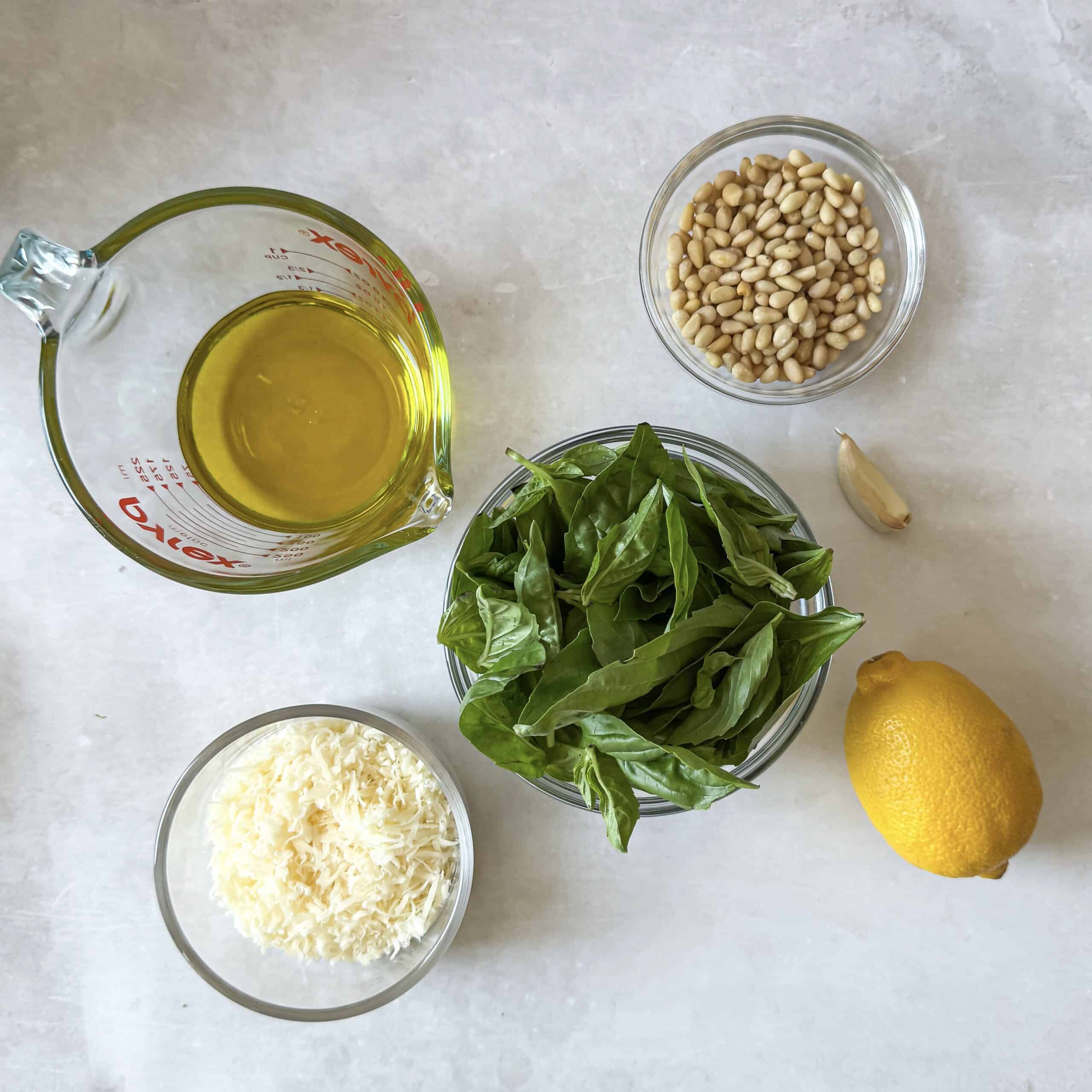 pesto ingredients on a table.