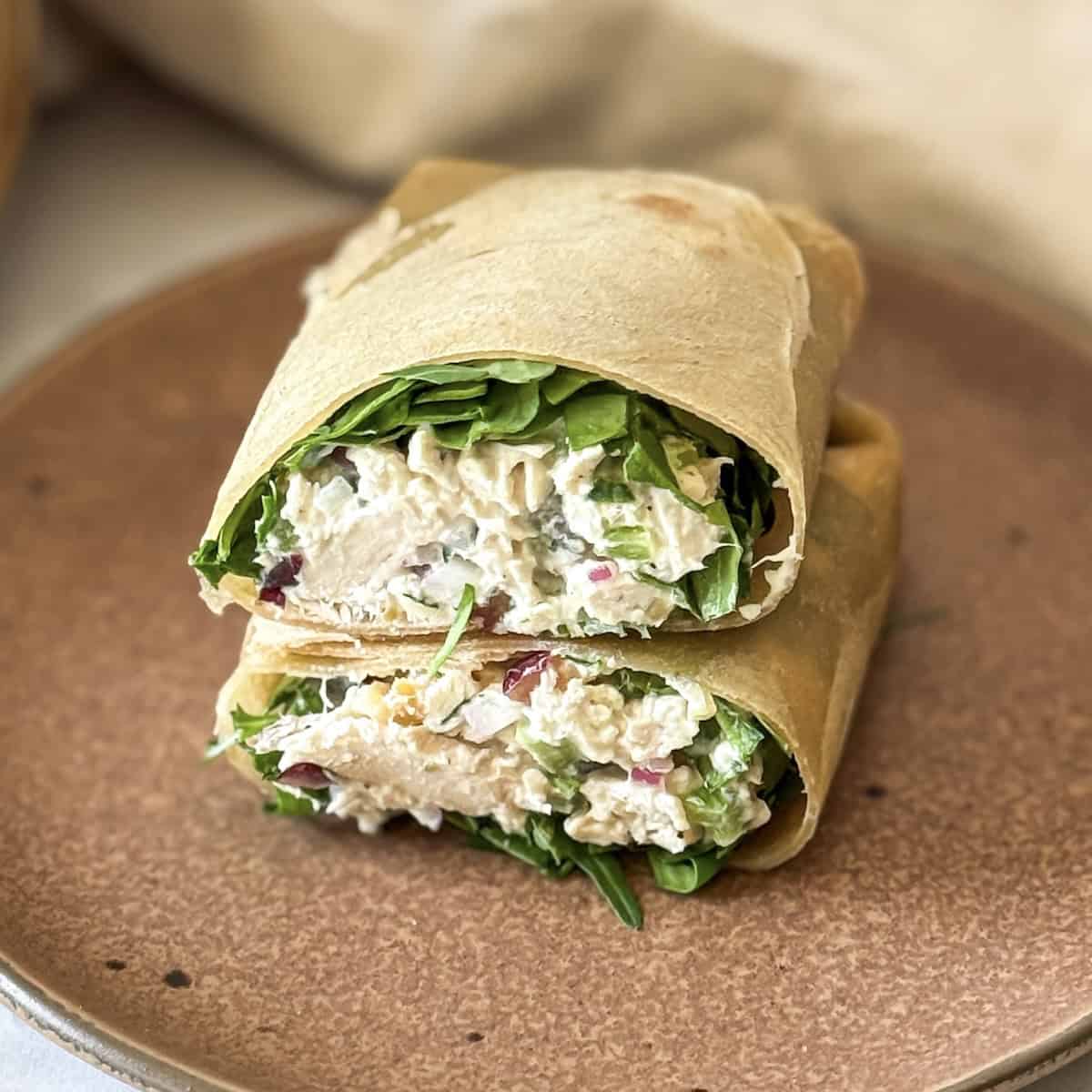 close up view of chicken salad wrap.