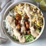 close up overhead view of street corn chicken rice bowl.