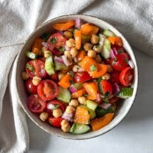 overhead view of chickpea salad with cilantro in a bowl.