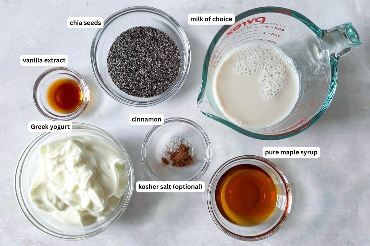 Ingredients for Chia Seed Pudding with Yogurt in individual containers on a table with labels.