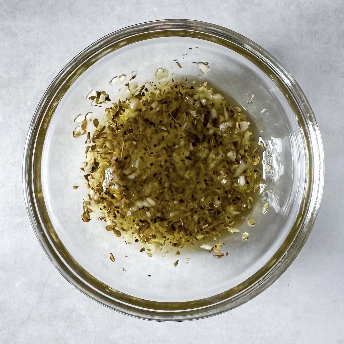 olive oil, garlic, salt, and pepper in a small bowl.