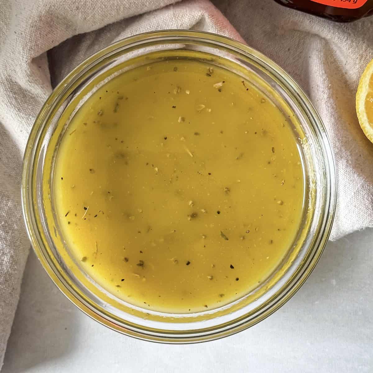 overhead view of honey lemon salad dressing.