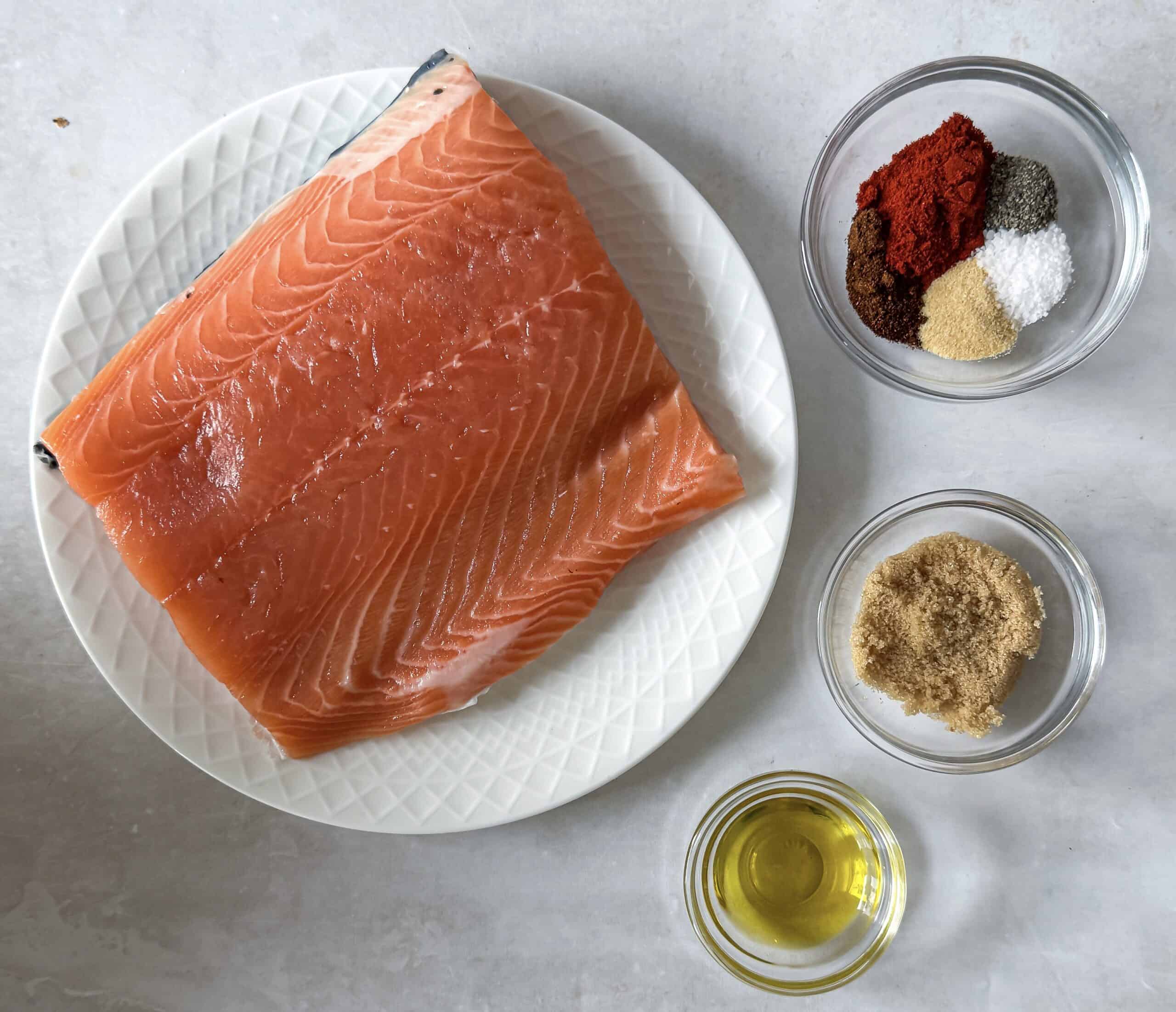 ingredients for smoked paprika salmon on a table.