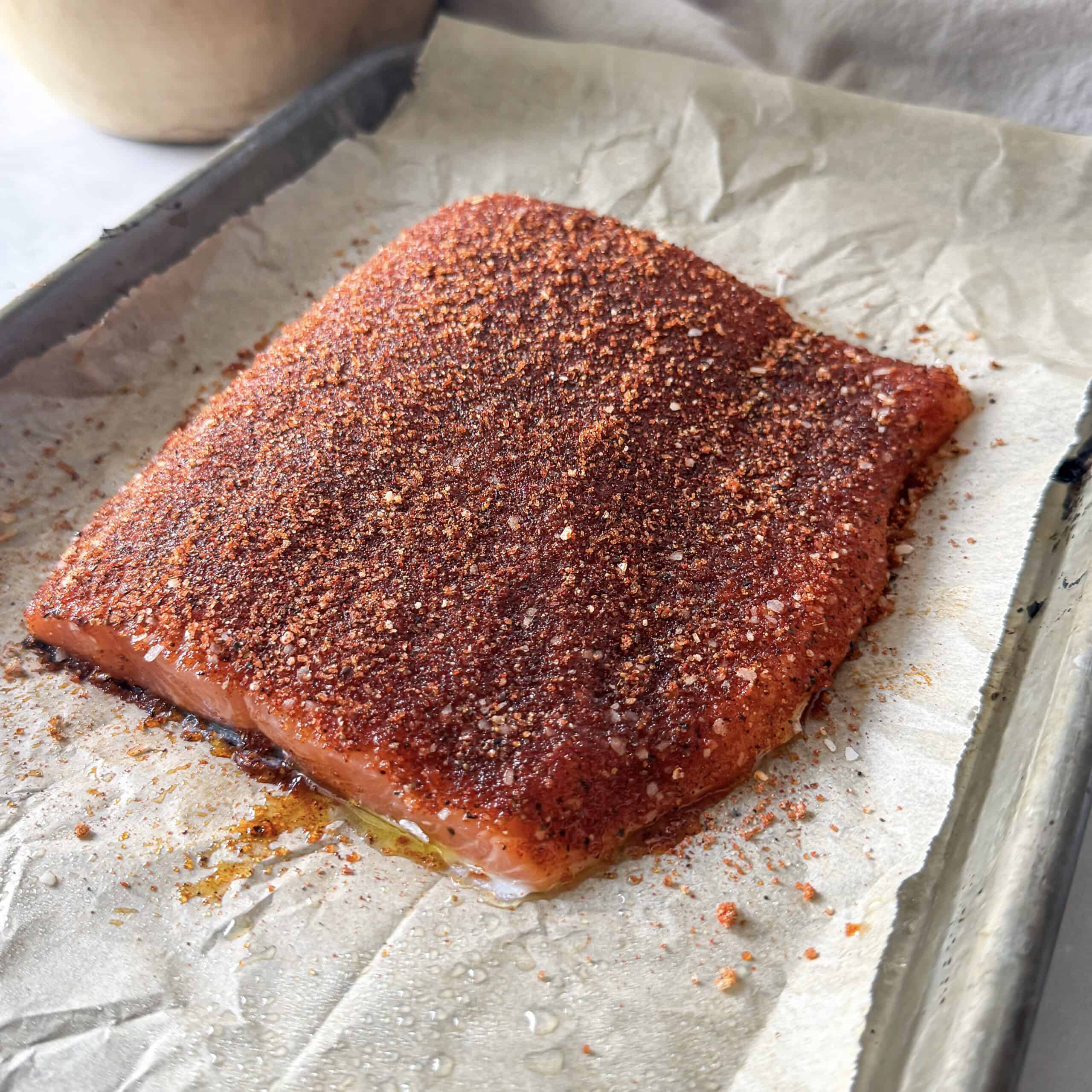 smoked paprika spice mixture rubbed into a salmon fillet.