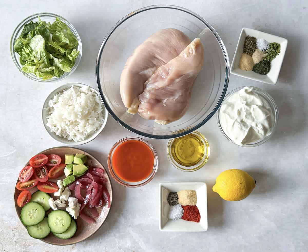 ingredients for buffalo chicken bowls on a table.