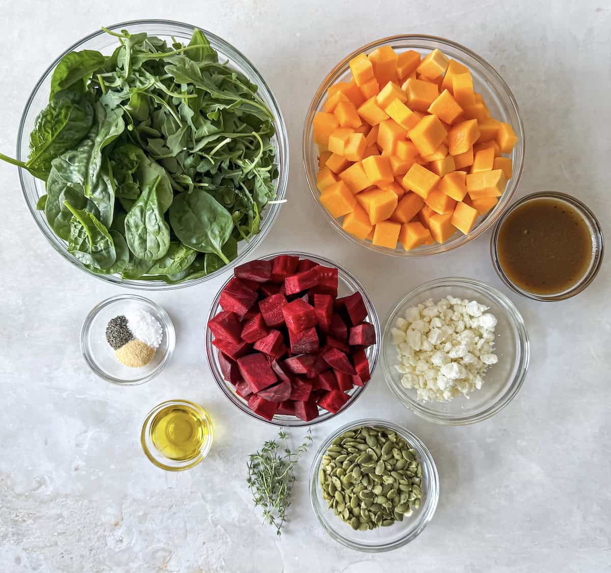 ingredients for butternut squash beet salad on a table.