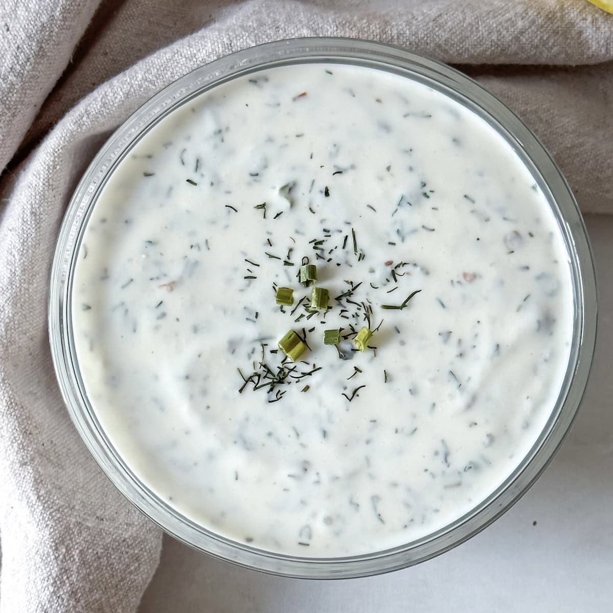 overhead view of healthy ranch dressing made with Greek yogurt.