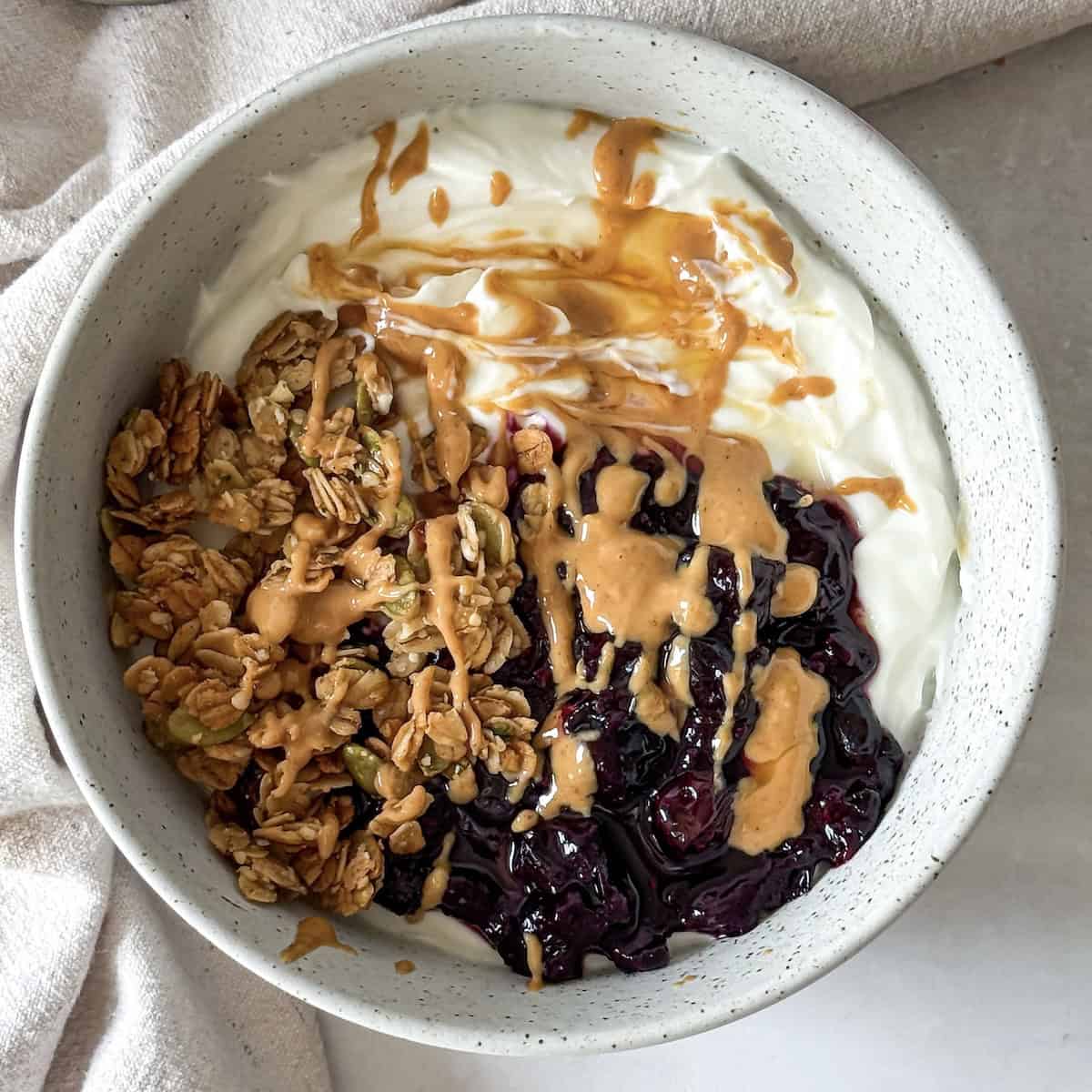 close up view of greek yogurt bowl.