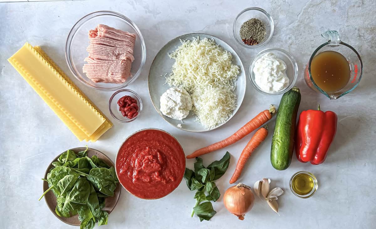 ingredients for lasagna soup on a table.