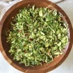overhead view of brussels sprouts salad, tossed.