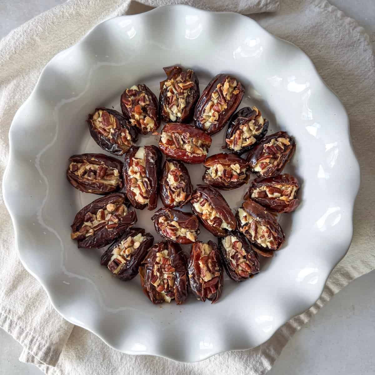 overhead view of goat cheese stuffed dates without christmas background.