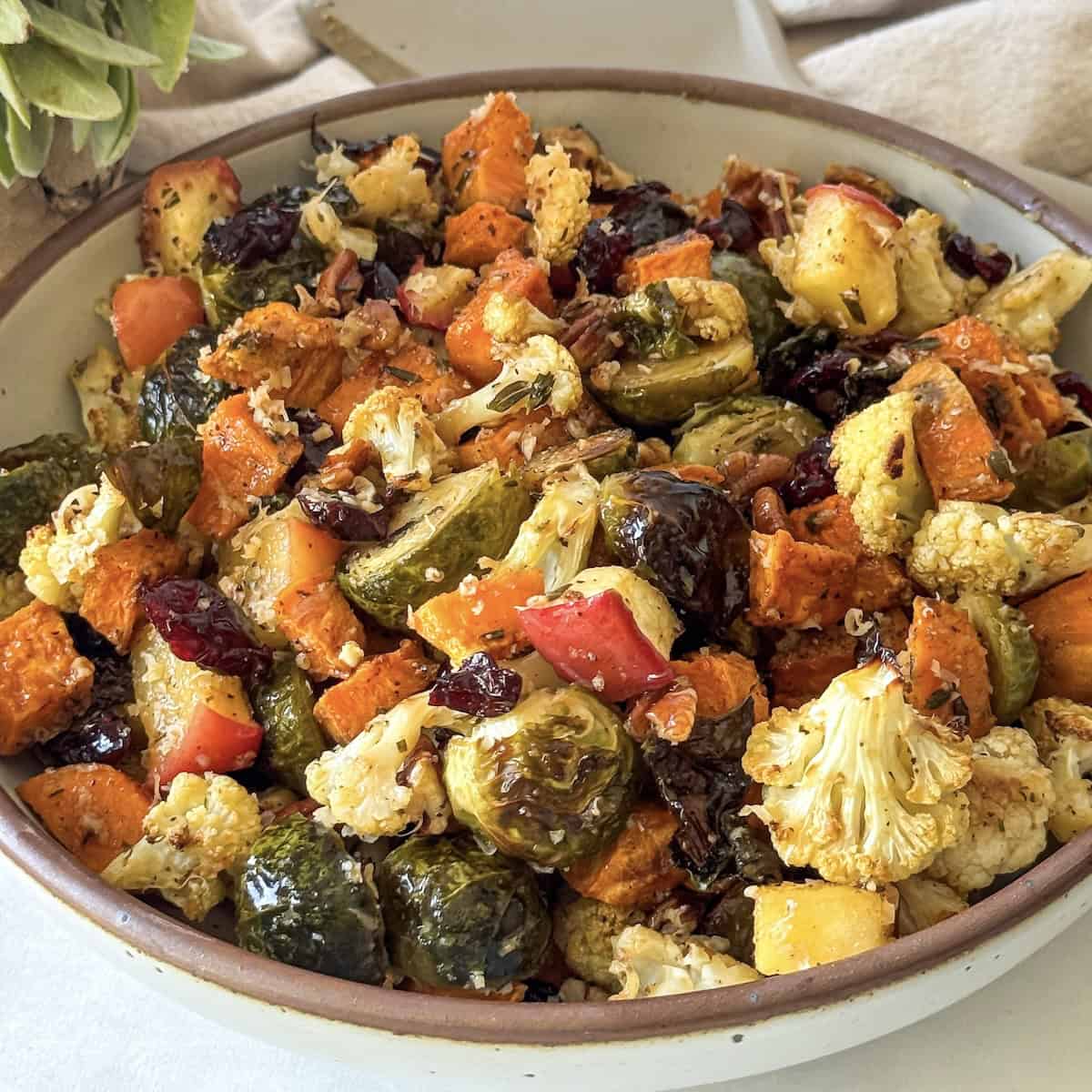 side view roasted brussels sprouts and sweet potatoes.