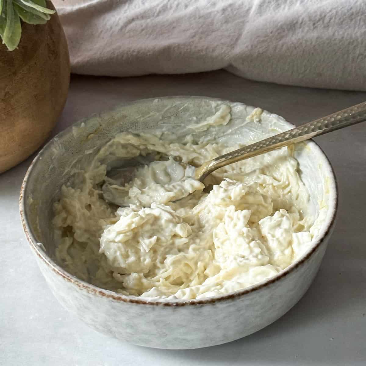 cheese, greek yogurt, lemon juice, and dijon in a bowl.